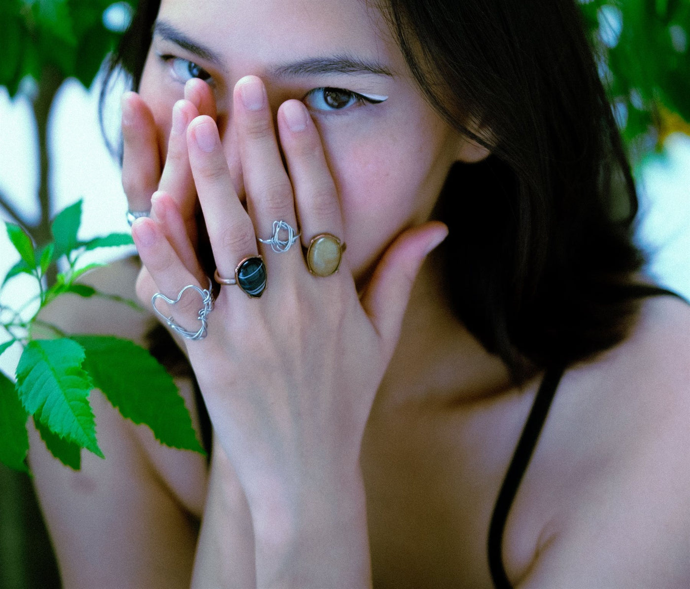 Serpentine jade signet ring worn on a hand